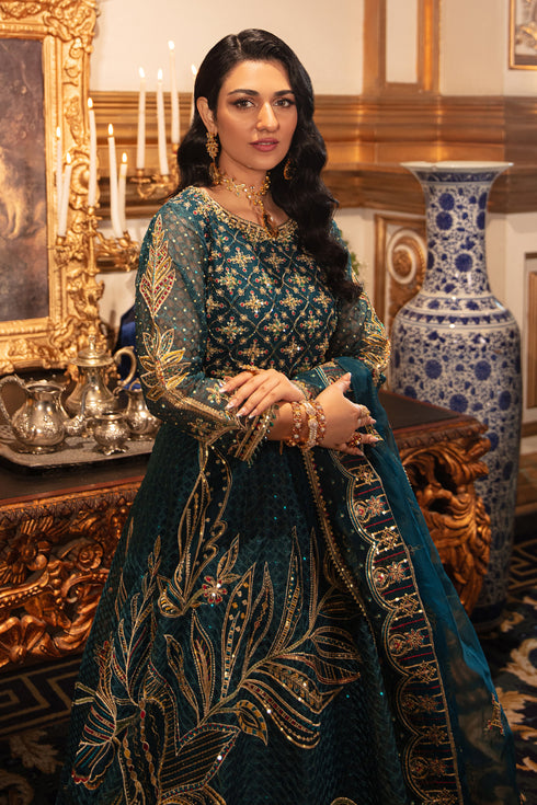 Zoom-in on bold floral side motif embroidery of naqshi zeemal lehenga with vibrant colors and mirrored sequin accents.